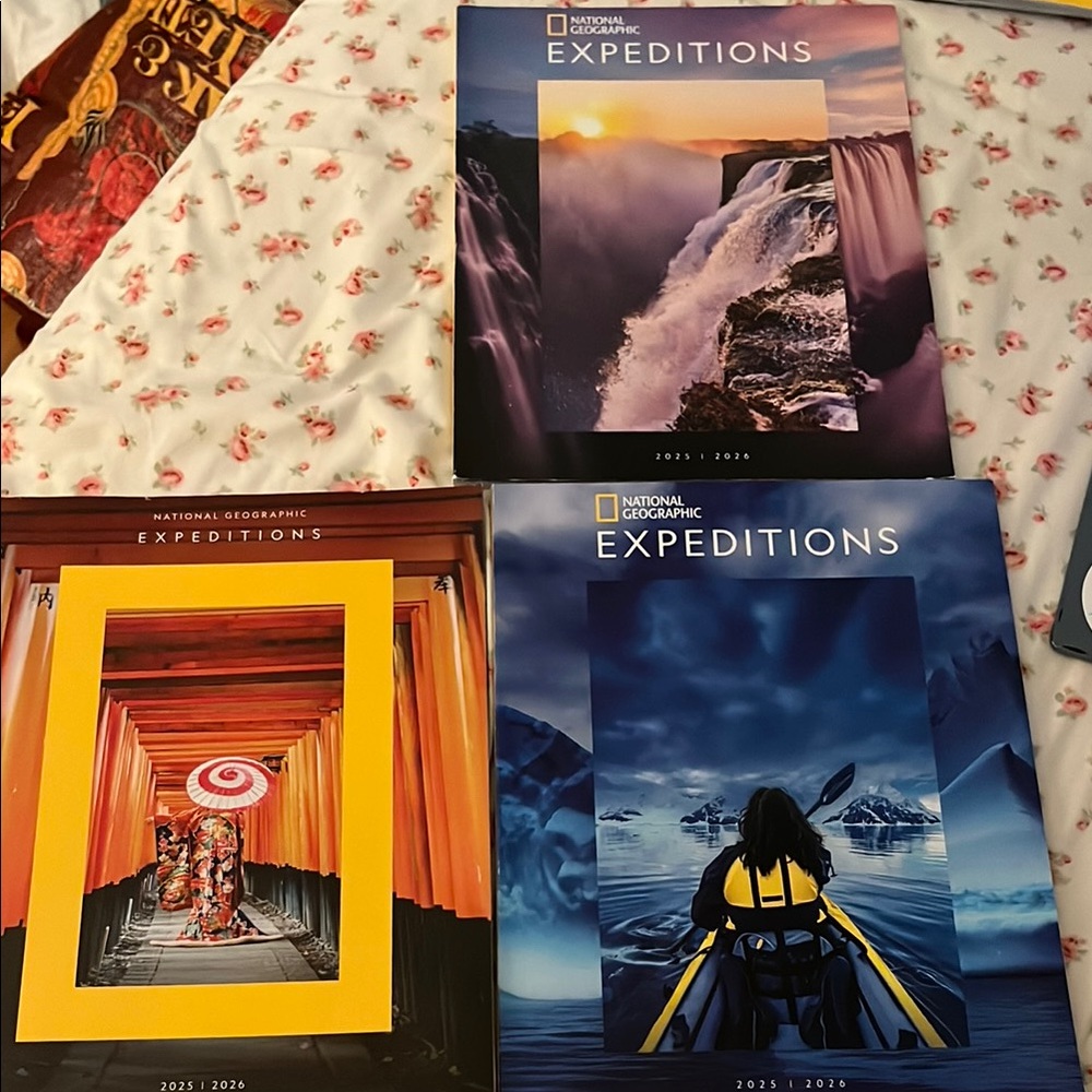 National Geographic Expeditions Brochures with Blue and Yellow Accents